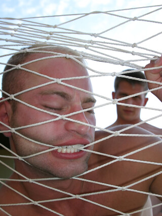 Sexy twinks Patrick Rouge & Chad Clovis fuck after having a mud fight