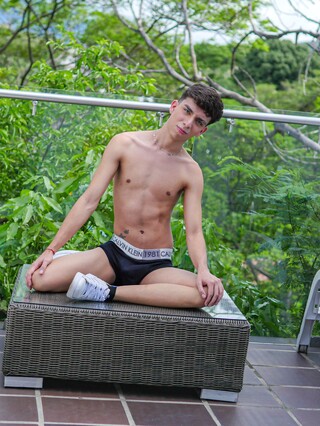 Skinny latino Liam Zuares playing with his uncut dick by BoyFun