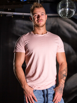 Young handsome Bryan sheds his clothes and reveals a big hard dick